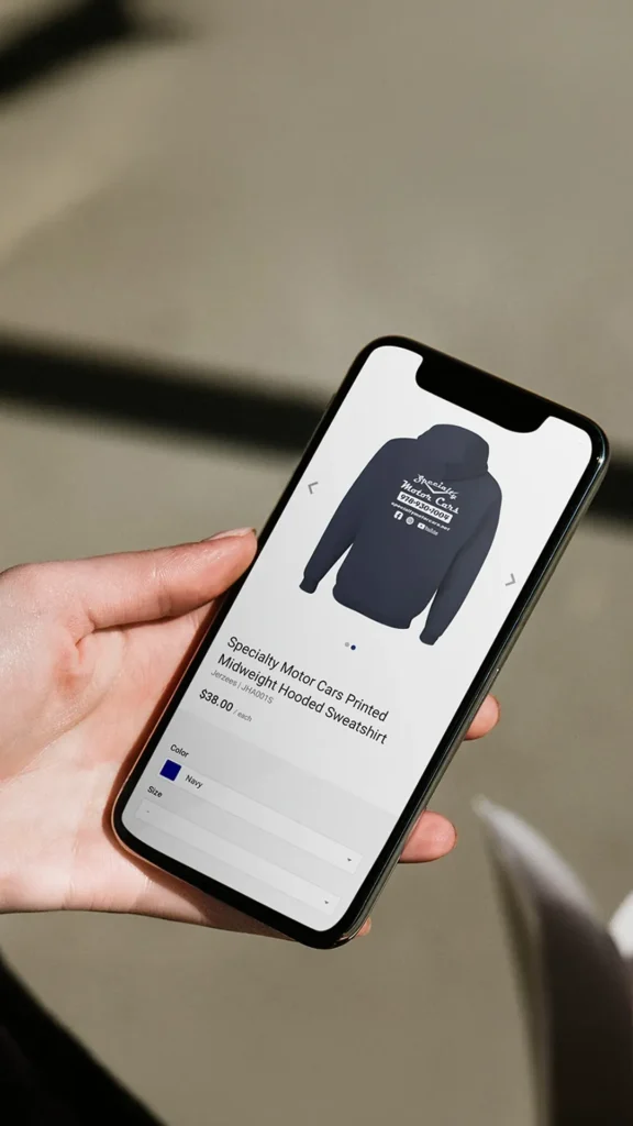 person holding a cellphone with an e-commerce store on the screen